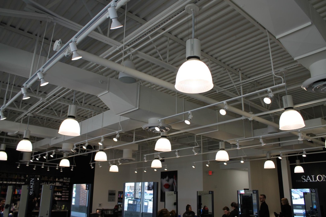 Exposed Mechanical, Electrical, and Plumbing on the Ceiling of The Salon Professional Academy in Trappe Borough, Montgomery County, PA Alta Design provided Architectural Design & Engineering, Structural Engineering, MEP & Fire Alarm Design, and Permitting services for this project.