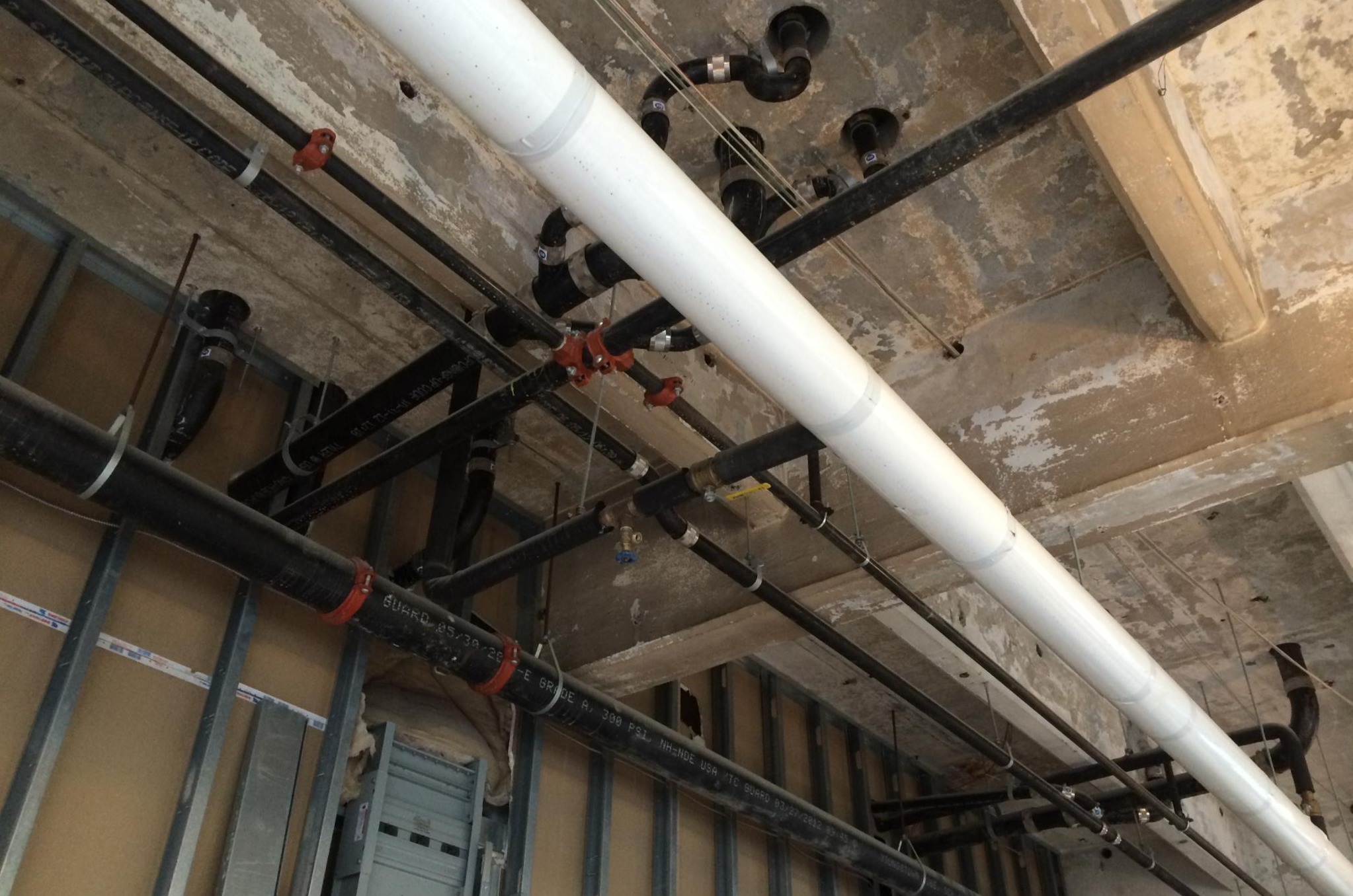 Plumbing Installed in Ceiling & Walls at Brick & Mortar Restaurant in Philadelphia, PA Alta Design provided MEP & Fire Alarm Design services for this project.